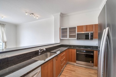 Beautifully updated corner-unit penthouse just steps to the - photo 15
