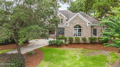 Hidden gem on a maturely landscaped & private .40/acre home site