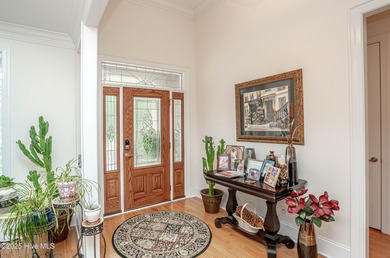 Hidden gem on a maturely landscaped & private .40/acre home site