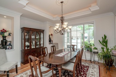 Hidden gem on a maturely landscaped & private .40/acre home site