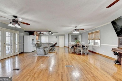 Situated on DEEP WATER,tucked away on nearly an acre along the - photo 11