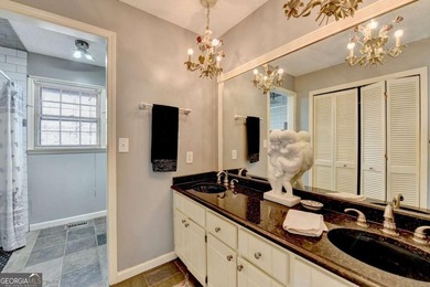 Situated on DEEP WATER,tucked away on nearly an acre along the - photo 14