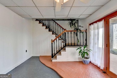 Situated on DEEP WATER,tucked away on nearly an acre along the - photo 16