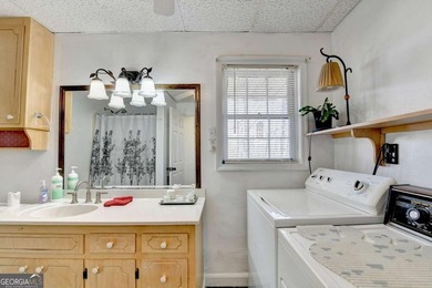 Situated on DEEP WATER,tucked away on nearly an acre along the - photo 20