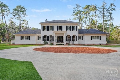 Set on four private acres off coveted Green Island Road, this - photo 2