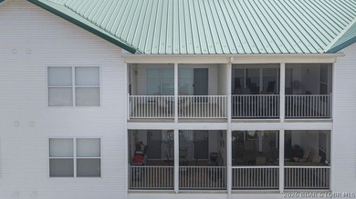 Top-floor living meets lakefront luxury at Newport Condominiums! - photo 43