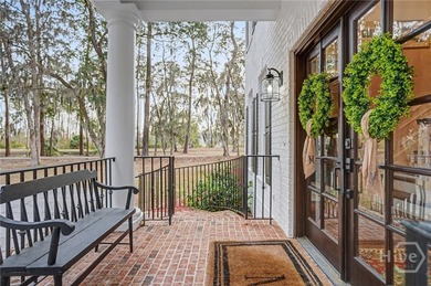 Set on four private acres off coveted Green Island Road, this - photo 3