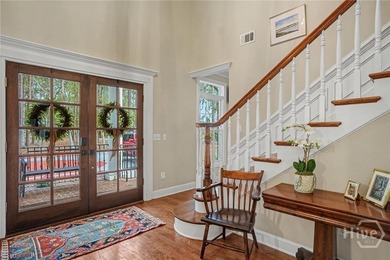 Set on four private acres off coveted Green Island Road, this - photo 4