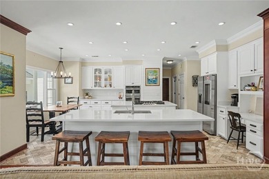 Set on four private acres off coveted Green Island Road, this - photo 7