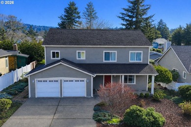 Enjoy coastal living in this spacious and versatile home with - photo 2