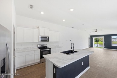 Welcome to this beautifully designed 2023-built 3-bedroom - photo 5