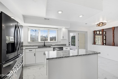 Beautifully updated Spanish style tri-level with an unfinished - photo 17