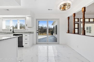Beautifully updated Spanish style tri-level with an unfinished - photo 21