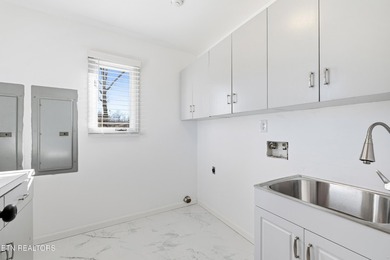 Beautifully updated Spanish style tri-level with an unfinished - photo 25