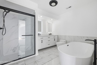 Beautifully updated Spanish style tri-level with an unfinished - photo 37