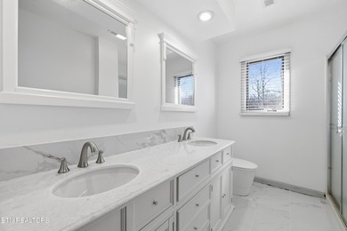 Beautifully updated Spanish style tri-level with an unfinished - photo 42