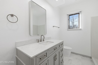 Beautifully updated Spanish style tri-level with an unfinished - photo 46