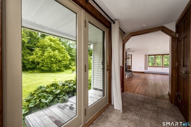 Blackberry River Oasis! With 1,100 feet of frontage on the - photo 11