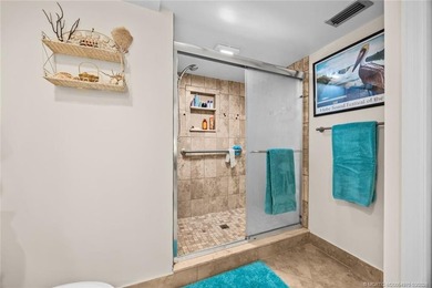 Totally remodeled first floor end unit in park like setting - photo 11