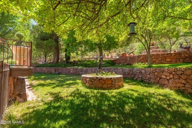 Set beneath the canopy of mature pines and just steps from the - photo 13