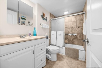 Totally remodeled first floor end unit in park like setting - photo 14