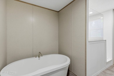 Step into this brand-new single-level home, featuring a fresh - photo 15