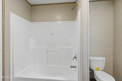 Step into this brand-new single-level home, featuring a fresh - photo 21
