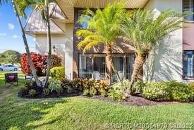 Totally remodeled first floor end unit in park like setting - photo 30