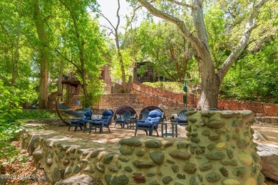 Set beneath the canopy of mature pines and just steps from the - photo 34