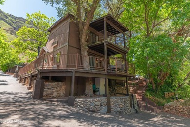 Set beneath the canopy of mature pines and just steps from the - photo 42