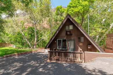 Set beneath the canopy of mature pines and just steps from the - photo 43