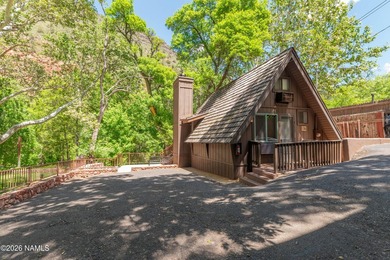 Set beneath the canopy of mature pines and just steps from the - photo 44