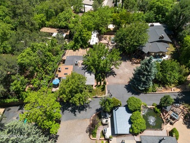 Set beneath the canopy of mature pines and just steps from the - photo 47