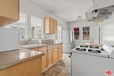 DELIVERED WITH ONE UNIT VACANT! Welcome to 1630 Franklin Street - photo 3