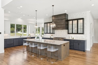 Reintroducing this 2021 custom built home with a newly - photo 11