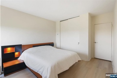 Corner end unit! Spacious two-bedroom, two-bathroom residence in - photo 12
