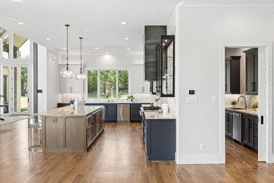 Reintroducing this 2021 custom built home with a newly - photo 13