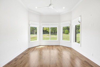 Reintroducing this 2021 custom built home with a newly - photo 27