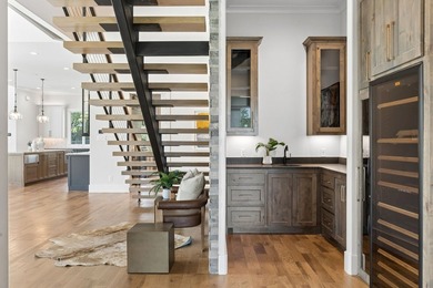 Reintroducing this 2021 custom built home with a newly - photo 29