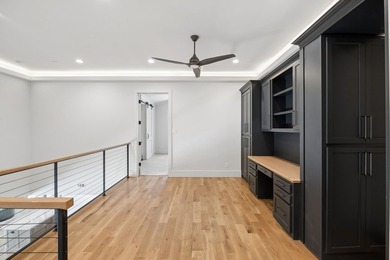 Reintroducing this 2021 custom built home with a newly - photo 31