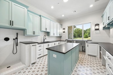 Reintroducing this 2021 custom built home with a newly - photo 36