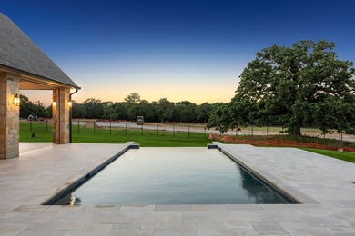 Reintroducing this 2021 custom built home with a newly - photo 40