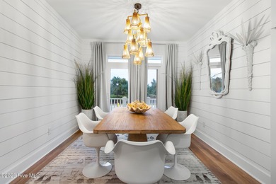 Beautifully upgraded end-unit townhome built in 2023, this Inlet