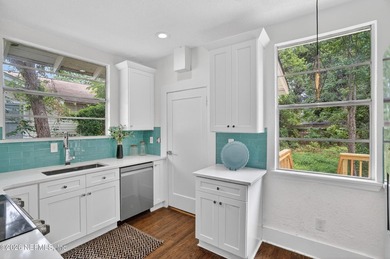Historic Riverside charm meets modern efficiency in this - photo 6