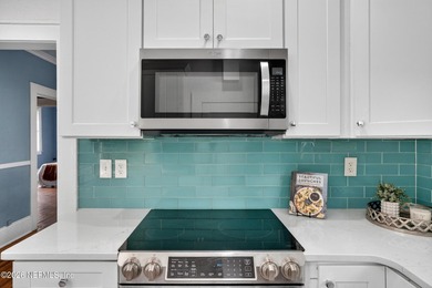 Historic Riverside charm meets modern efficiency in this - photo 8