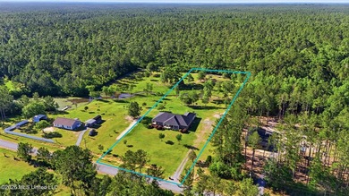 Tucked away on 3 beautiful acres and backing up to De Soto - photo 2
