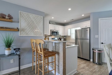 Welcome to Admirals Quarters II, a rare opportunity to own an - photo 12