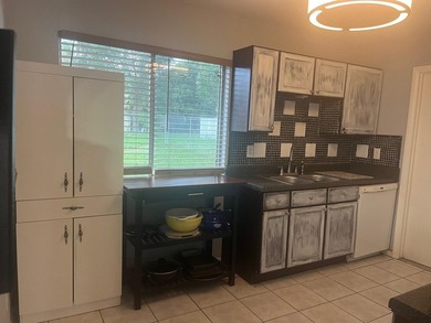 Opportunity awaits with this cute 2BR, 1.5-bath home in the - photo 4