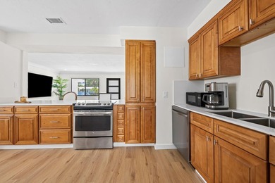 Welcome to this beautifully updated 3-bedroom, 2-bath residence - photo 13