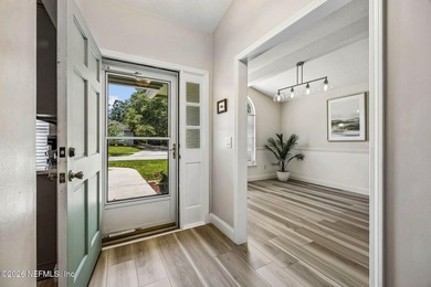 Beautifully remodeled in Hunters Green, this extensive - photo 6